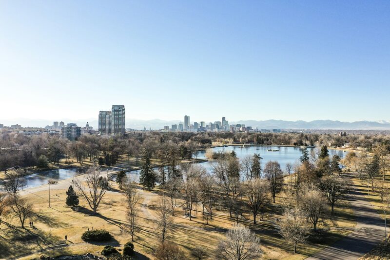 Colorado city skyline with the Rocky Mountains on the horizon